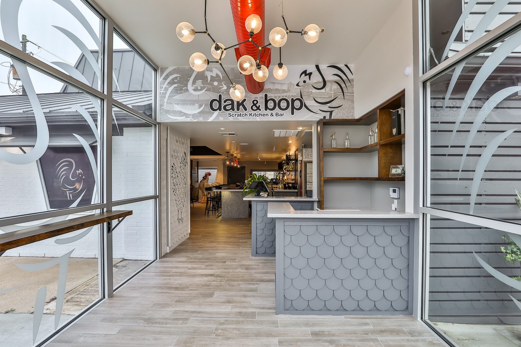 Dining room and bar at Dak & Bop 18th Street in Houston